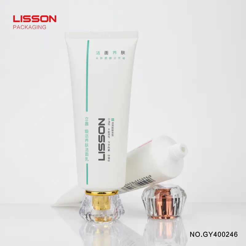 white cosmetic tube 120ml round tube with acrylic diamond cap for facial cleanser