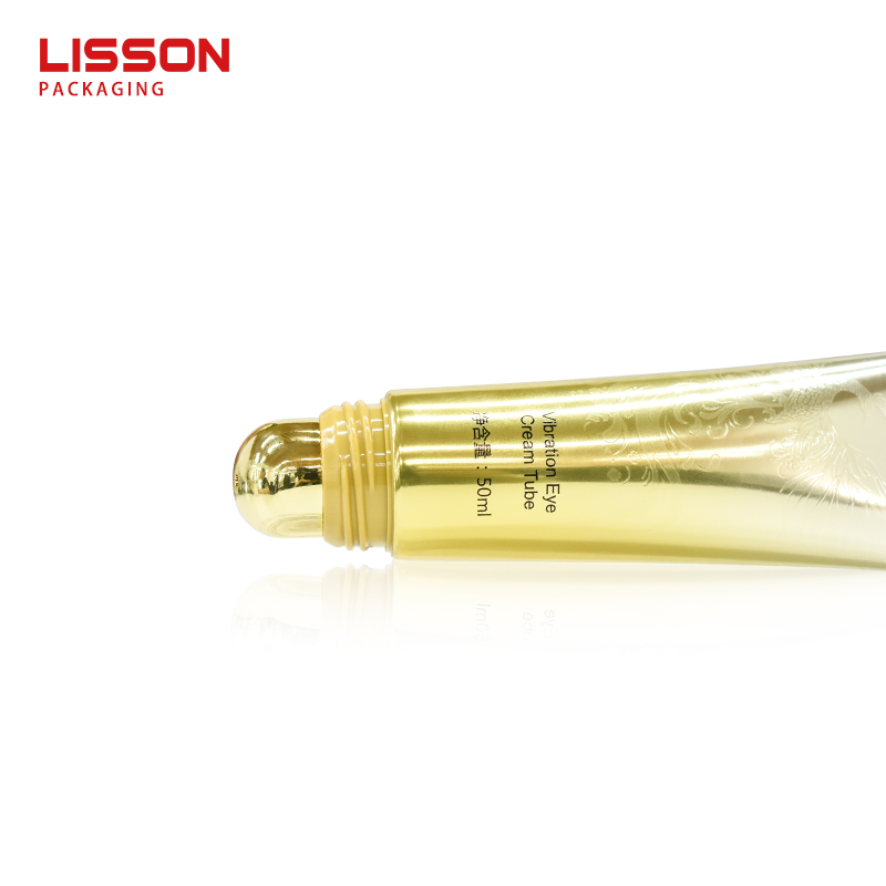 3d embossed accent zinc alloy slanted tip massager/ micro vibrator eye cream squeeze tube